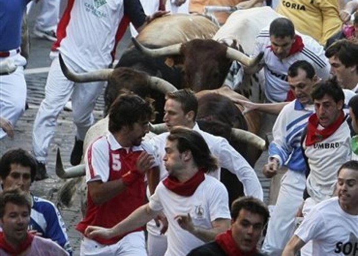 Spanish Red Cross Ole! Running of the bulls begins in Spain, 2 hurt - The San Diego ... photo